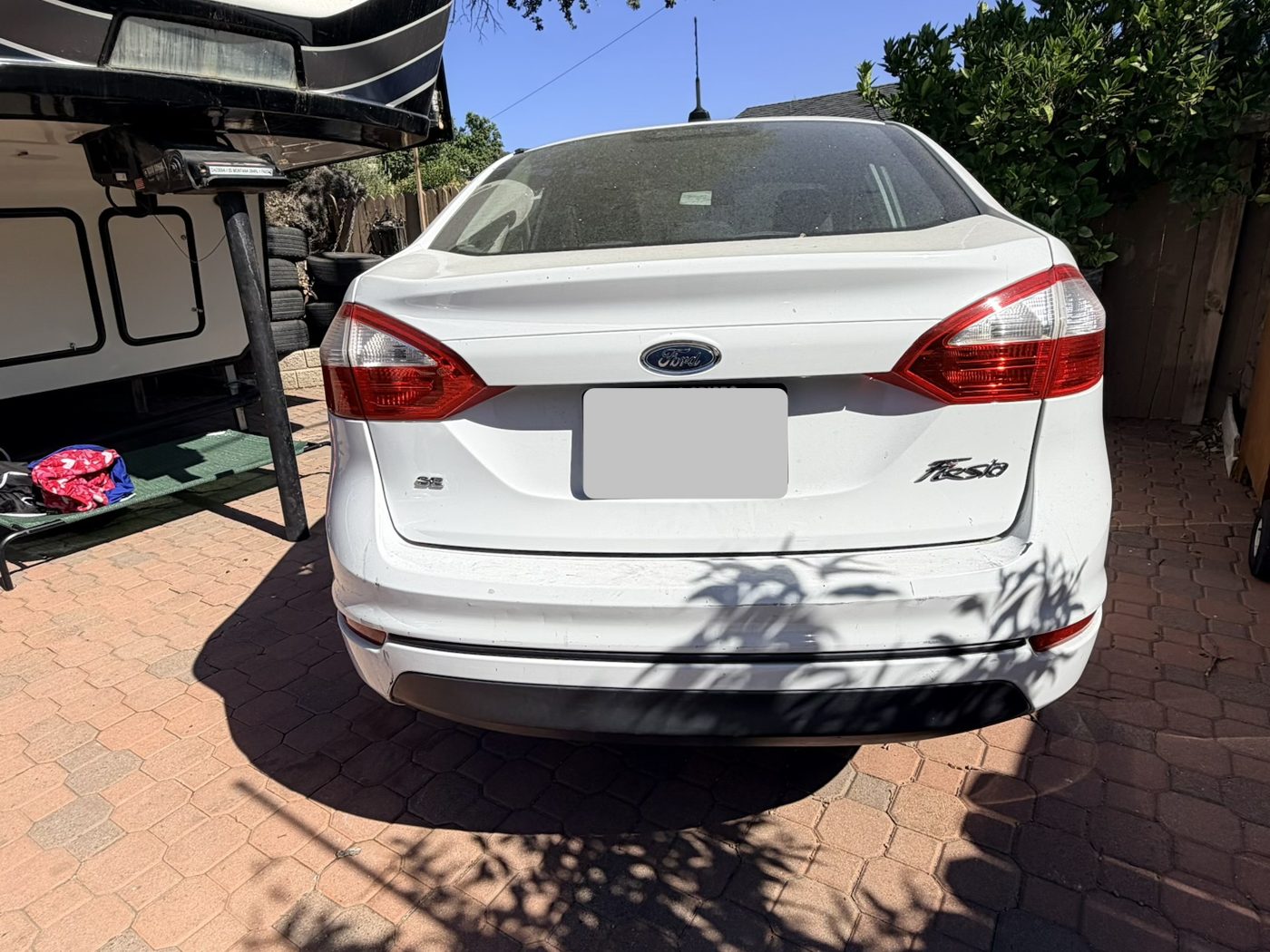 Sedan exterior before wash, dirty paint and bumper